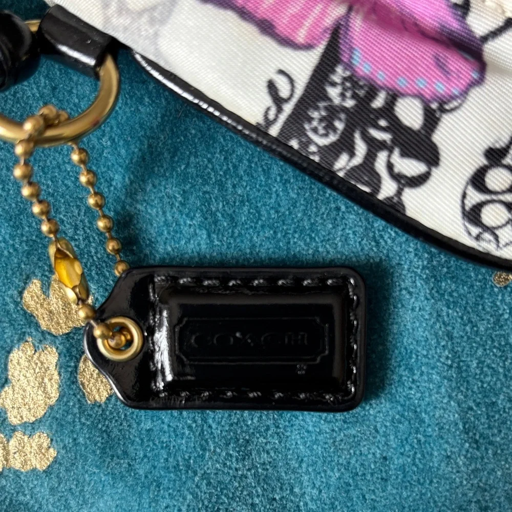 Coach Multicolor Butterfly Print Wristlet with Black Trim - Picture 2 of 6